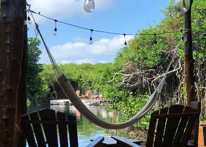 - Aldea Mangle & Cenote Lodge Tulum