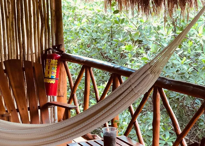 - Aldea Mangle & Cenote Tulum